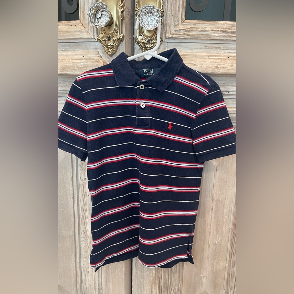 Polo by Ralph Lauren 
Boys size 7
Navy with white, red, and light blue stripes